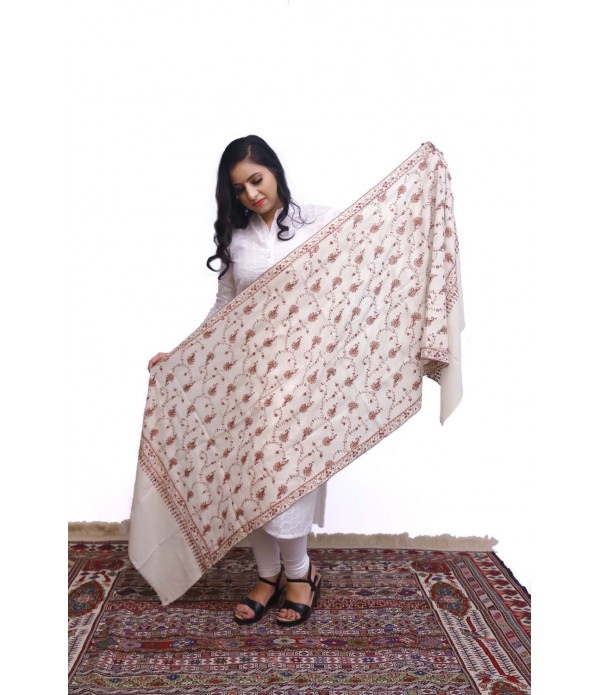 Beige pashmina with spiral flower embroidery.