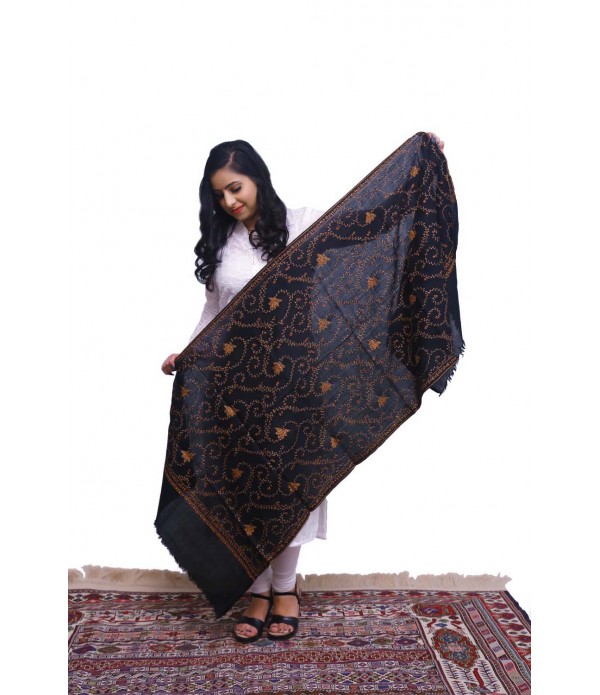 Black pashmina with orange thread embroidery.